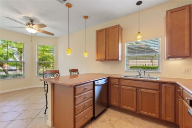 For sale is a charming Melody model nestled in a serene on Stonegate Golf Club in Florida - for sale on GolfHomes.com, golf home, golf lot