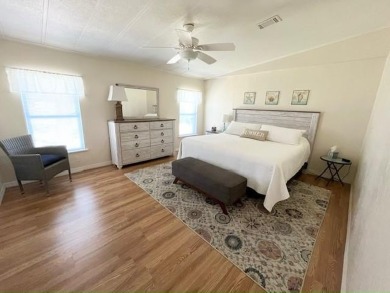 Beautifully maintained open-concept 2-bd/2-ba home is situated on Del Tura Golf and Country Club in Florida - for sale on GolfHomes.com, golf home, golf lot