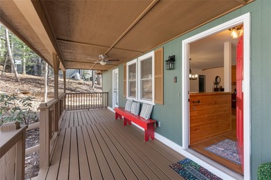 Experience the ease of relaxed mountain living in this inviting on Sapphire National Golf Club in North Carolina - for sale on GolfHomes.com, golf home, golf lot