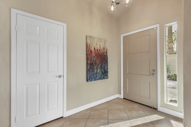 Wow! This reimagined Laredo plan has been opened into a stylish on The Lakes Country Club in California - for sale on GolfHomes.com, golf home, golf lot