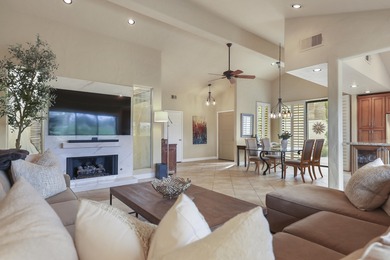 Wow! This reimagined Laredo plan has been opened into a stylish on The Lakes Country Club in California - for sale on GolfHomes.com, golf home, golf lot