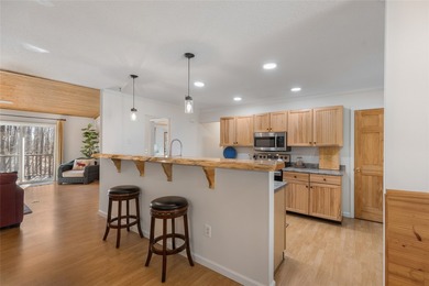 Experience the ease of relaxed mountain living in this inviting on Sapphire National Golf Club in North Carolina - for sale on GolfHomes.com, golf home, golf lot