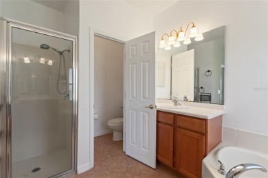 For sale is a charming Melody model nestled in a serene on Stonegate Golf Club in Florida - for sale on GolfHomes.com, golf home, golf lot