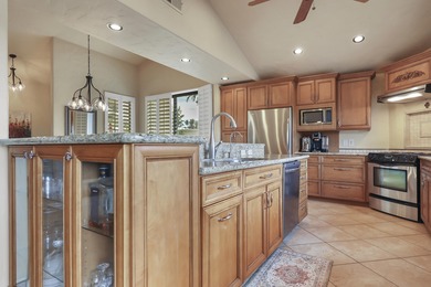 Wow! This reimagined Laredo plan has been opened into a stylish on The Lakes Country Club in California - for sale on GolfHomes.com, golf home, golf lot