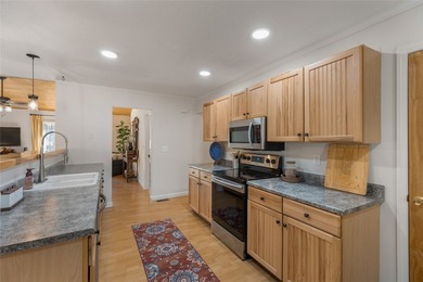 Experience the ease of relaxed mountain living in this inviting on Sapphire National Golf Club in North Carolina - for sale on GolfHomes.com, golf home, golf lot