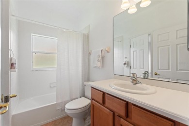 For sale is a charming Melody model nestled in a serene on Stonegate Golf Club in Florida - for sale on GolfHomes.com, golf home, golf lot