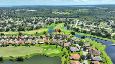 For sale is a charming Melody model nestled in a serene on Stonegate Golf Club in Florida - for sale on GolfHomes.com, golf home, golf lot