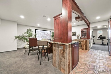 Strikingly situated in the gated community of Buffalo Ridge on Country Club at Castle Pines in Colorado - for sale on GolfHomes.com, golf home, golf lot