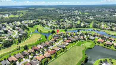 For sale is a charming Melody model nestled in a serene on Stonegate Golf Club in Florida - for sale on GolfHomes.com, golf home, golf lot
