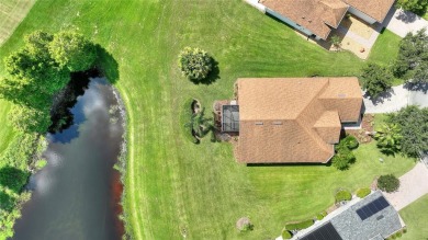 For sale is a charming Melody model nestled in a serene on Stonegate Golf Club in Florida - for sale on GolfHomes.com, golf home, golf lot