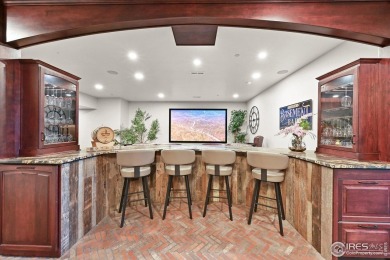 Strikingly situated in the gated community of Buffalo Ridge on Country Club at Castle Pines in Colorado - for sale on GolfHomes.com, golf home, golf lot