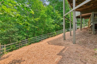 Located on a 1.5 acre lot within the gated mountain community of on Big Canoe Golf Club - Cherokee in Georgia - for sale on GolfHomes.com, golf home, golf lot