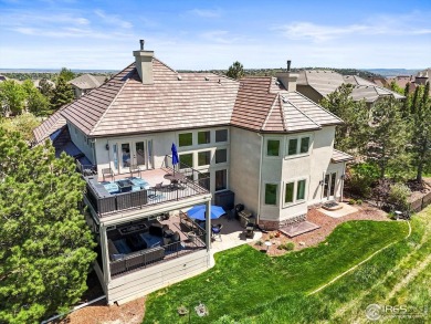 Strikingly situated in the gated community of Buffalo Ridge on Country Club at Castle Pines in Colorado - for sale on GolfHomes.com, golf home, golf lot