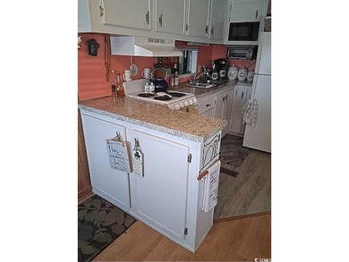 Discover a coastal haven where relaxation and recreation meet on Arcadian Shores Golf Club in South Carolina - for sale on GolfHomes.com, golf home, golf lot