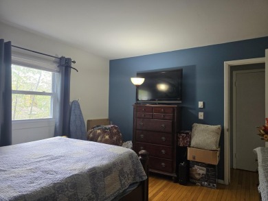 This 4 bedroom, 2 bath split level home sits in an amenity on Pocono Farms Country Club in Pennsylvania - for sale on GolfHomes.com, golf home, golf lot
