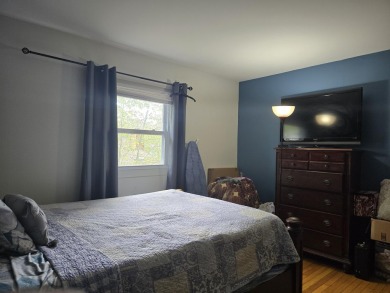 This 4 bedroom, 2 bath split level home sits in an amenity on Pocono Farms Country Club in Pennsylvania - for sale on GolfHomes.com, golf home, golf lot