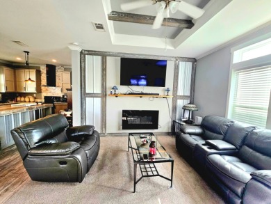 This 2020 farmhouse in Cypress Lakes Village offers 2 bedrooms on Big Cypress Golf and Country Club in Florida - for sale on GolfHomes.com, golf home, golf lot