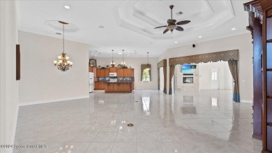 Discover your dream oasis in the heart of Hidden Lakes, nestled on The Great Outdoors Golf and Country Club in Florida - for sale on GolfHomes.com, golf home, golf lot