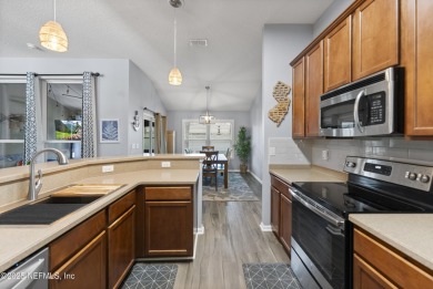 Welcome to this beautifully maintained 4-bedroom, 2-bath home in on King and Bear Golf Course/World Golf Village in Florida - for sale on GolfHomes.com, golf home, golf lot