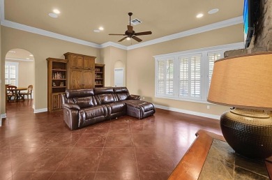 This 4-bedroom, 2.5-bathroom home features a spacious living on Twin Rivers Golf Club in Texas - for sale on GolfHomes.com, golf home, golf lot
