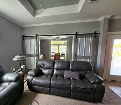 This 2020 farmhouse in Cypress Lakes Village offers 2 bedrooms on Big Cypress Golf and Country Club in Florida - for sale on GolfHomes.com, golf home, golf lot