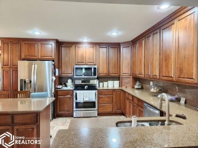 STUNNING ONE OF A KIND EQUESTRIAN PROPERTY! This is a rare find on Mason City Country Club in Iowa - for sale on GolfHomes.com, golf home, golf lot