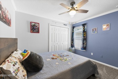 Welcome to this beautifully maintained 4-bedroom, 2-bath home in on King and Bear Golf Course/World Golf Village in Florida - for sale on GolfHomes.com, golf home, golf lot