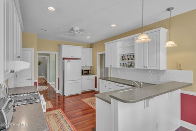 Welcome home! This 3-bedroom, 2.5-bath house sits under a canopy on The Carolina Club in North Carolina - for sale on GolfHomes.com, golf home, golf lot