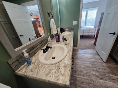 This 2020 farmhouse in Cypress Lakes Village offers 2 bedrooms on Big Cypress Golf and Country Club in Florida - for sale on GolfHomes.com, golf home, golf lot