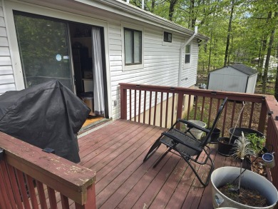This 4 bedroom, 2 bath split level home sits in an amenity on Pocono Farms Country Club in Pennsylvania - for sale on GolfHomes.com, golf home, golf lot