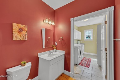 Welcome to this beautiful 3-bedroom, 2.5-bathroom home nestled on The Carolina Club in North Carolina - for sale on GolfHomes.com, golf home, golf lot
