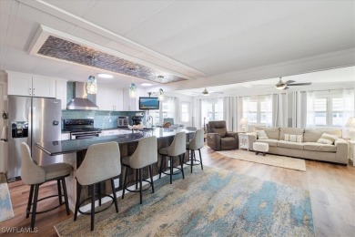 Discover your slice of paradise in this beautifully updated on Pelicans Nest Golf Club in Florida - for sale on GolfHomes.com, golf home, golf lot