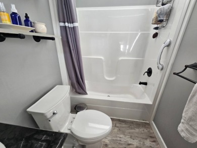 This 2020 farmhouse in Cypress Lakes Village offers 2 bedrooms on Big Cypress Golf and Country Club in Florida - for sale on GolfHomes.com, golf home, golf lot