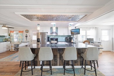 Discover your slice of paradise in this beautifully updated on Pelicans Nest Golf Club in Florida - for sale on GolfHomes.com, golf home, golf lot
