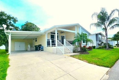 This 2020 farmhouse in Cypress Lakes Village offers 2 bedrooms on Big Cypress Golf and Country Club in Florida - for sale on GolfHomes.com, golf home, golf lot