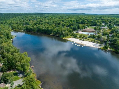 This 4 bedroom, 2 bath split level home sits in an amenity on Pocono Farms Country Club in Pennsylvania - for sale on GolfHomes.com, golf home, golf lot