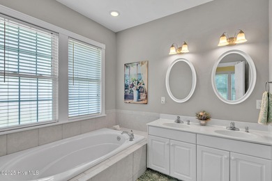 Welcome home! This 3-bedroom, 2.5-bath house sits under a canopy on The Carolina Club in North Carolina - for sale on GolfHomes.com, golf home, golf lot