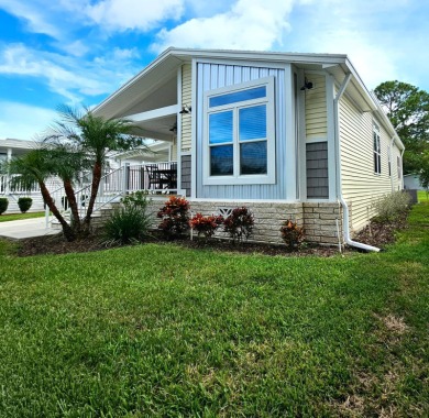 This 2020 farmhouse in Cypress Lakes Village offers 2 bedrooms on Big Cypress Golf and Country Club in Florida - for sale on GolfHomes.com, golf home, golf lot