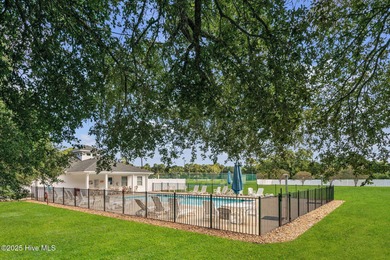 Welcome home! This 3-bedroom, 2.5-bath house sits under a canopy on The Carolina Club in North Carolina - for sale on GolfHomes.com, golf home, golf lot