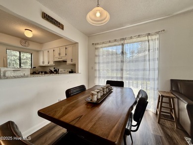 This first floor St. Andrews 2-bedroom, 2-bathroom lakefront on Pinehurst Resort and Country Club in North Carolina - for sale on GolfHomes.com, golf home, golf lot