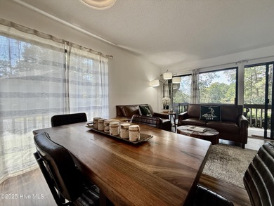 This first floor St. Andrews 2-bedroom, 2-bathroom lakefront on Pinehurst Resort and Country Club in North Carolina - for sale on GolfHomes.com, golf home, golf lot