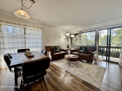 This first floor St. Andrews 2-bedroom, 2-bathroom lakefront on Pinehurst Resort and Country Club in North Carolina - for sale on GolfHomes.com, golf home, golf lot