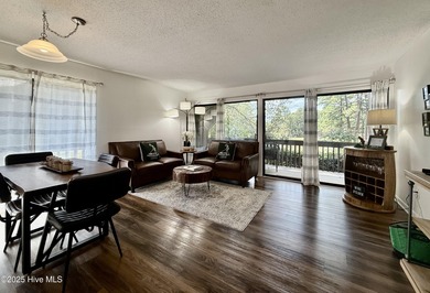 This first floor St. Andrews 2-bedroom, 2-bathroom lakefront on Pinehurst Resort and Country Club in North Carolina - for sale on GolfHomes.com, golf home, golf lot