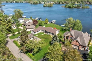 Exquisite Lakefront Ranch on Crooked Lake- Discover the perfect on Oak Pointe Country Club in Michigan - for sale on GolfHomes.com, golf home, golf lot