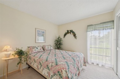 This one is a gem! With stylish finishes, wood flooring, cozy on Palm Aire Country Club of Sarasota in Florida - for sale on GolfHomes.com, golf home, golf lot