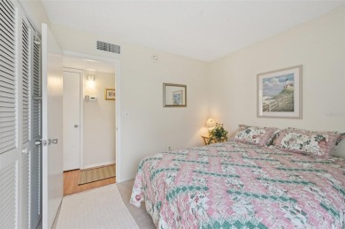 This one is a gem! With stylish finishes, wood flooring, cozy on Palm Aire Country Club of Sarasota in Florida - for sale on GolfHomes.com, golf home, golf lot