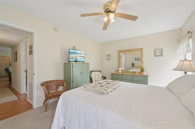 This one is a gem! With stylish finishes, wood flooring, cozy on Palm Aire Country Club of Sarasota in Florida - for sale on GolfHomes.com, golf home, golf lot