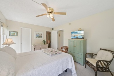This one is a gem! With stylish finishes, wood flooring, cozy on Palm Aire Country Club of Sarasota in Florida - for sale on GolfHomes.com, golf home, golf lot