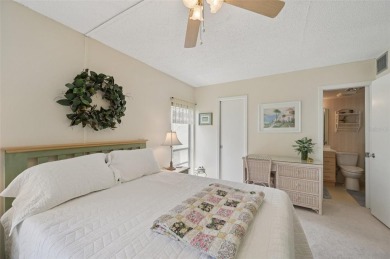 This one is a gem! With stylish finishes, wood flooring, cozy on Palm Aire Country Club of Sarasota in Florida - for sale on GolfHomes.com, golf home, golf lot