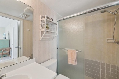 This one is a gem! With stylish finishes, wood flooring, cozy on Palm Aire Country Club of Sarasota in Florida - for sale on GolfHomes.com, golf home, golf lot